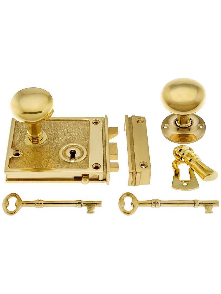 Solid Brass Horizontal Rim Lock Set with Small Round Knobs.